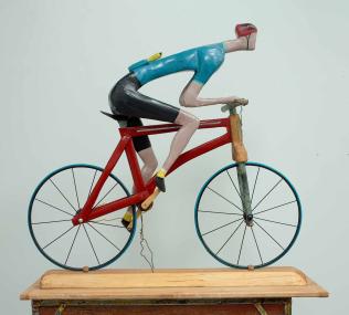 Banana Man, 2024, mixed metal, pine, acrylic paint and electrical cord, 37.5 x 40 x 16 inches